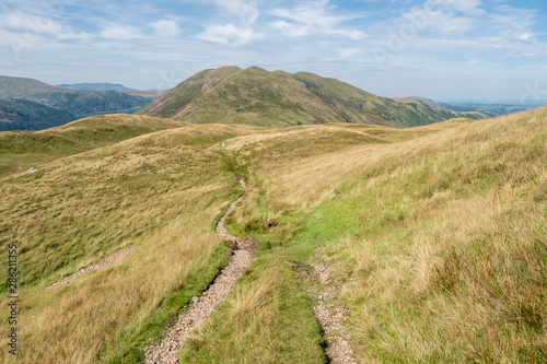 Hikking between Brotherswater and Angle Tarn near Patterdale in the English Lake Districr surrounded by many Wainwrights © RamblingTog