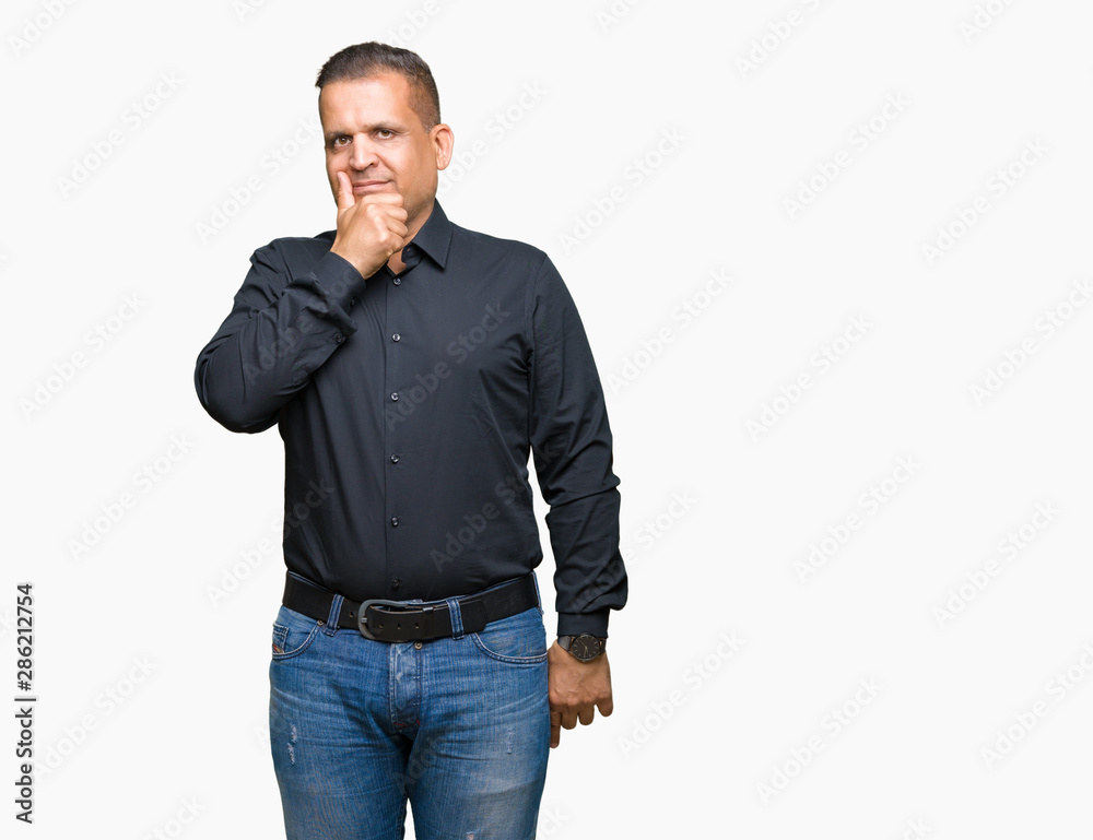 Handsome middle age arab business man over isolated background looking confident at the camera with smile with crossed arms and hand raised on chin. Thinking positive. Handsome middle age arab business man over isolated background looking confident at the camera with smile with crossed arms and hand raised on chin. Thinking positive.