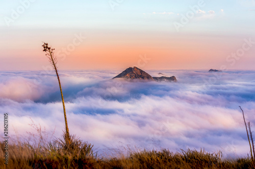 Peak Above the Cloud Layer from High View