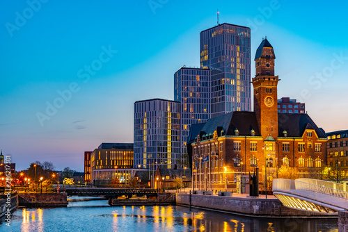 Sunset view of skyline of Malmo dominated by the world maritime university, Sweden photo