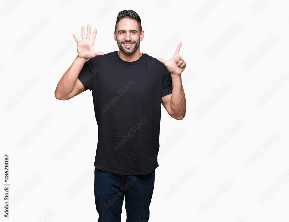 Young handsome man over isolated background showing and pointing up with fingers number seven while smiling confident and happy. Young handsome man over isolated background showing and pointing up with fingers number seven while smiling confident and happy.