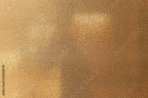 Golden color modern cloth texture of artificial snake skin background