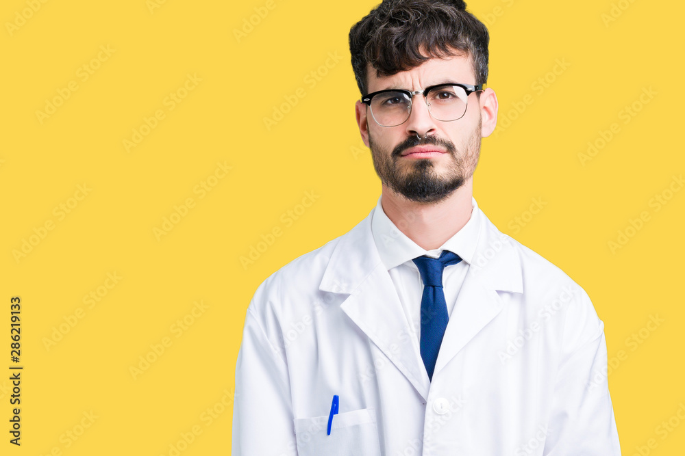 Young professional scientist man wearing white coat over isolated background depressed and worry for distress, crying angry and afraid. Sad expression. Young professional scientist man wearing white coat over isolated background depressed and worry for distress, crying angry and afraid. Sad expression.