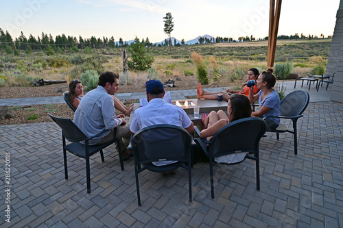 Wallpaper Mural Six friends around a fire pit enjoy afternoon view of landscape around Sisters, Oregon on a perfect summer afternoon. Torontodigital.ca