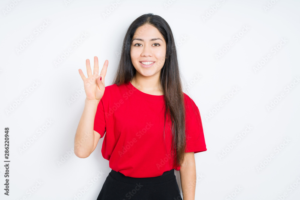 Beautiful brunette woman wearing red t-shirt over isolated background showing and pointing up with fingers number four while smiling confident and happy. Beautiful brunette woman wearing red t-shirt over isolated background showing and pointing up with fingers number four while smiling confident and happy.