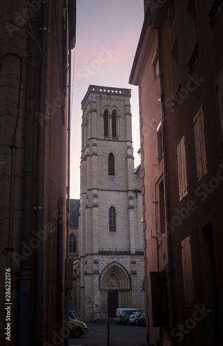 Eglise Saint Jean Baptiste Church at dusk in Bourgoin Jallieu, France, a city of Dauphine region, in Isere Departement. It is the main catholic church of this city, built in the 19th century photo