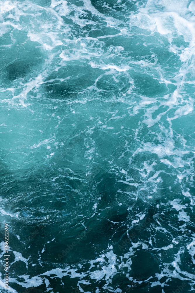 Swirling blue Waters in Pacific Ocean Vertical Swirling blue Waters in Pacific Ocean Vertical