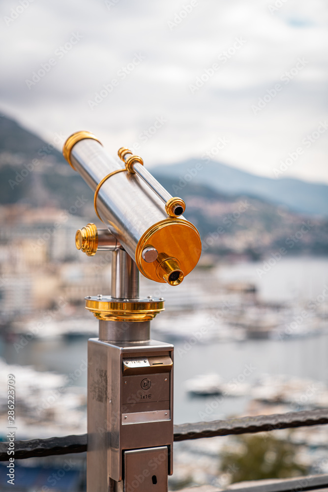 Telescope on coastal city