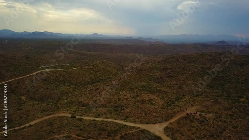 Aerial drone shot of the Arizona mountains and landscape on a cloudy day. photo