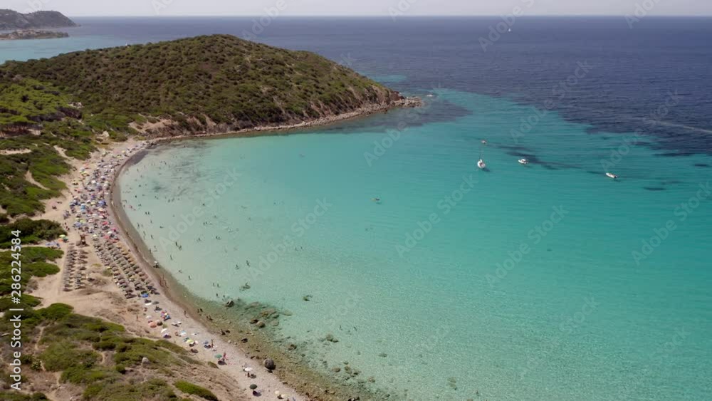 Amazing aerial shot of a beautiful beach with turquoise sea, Mari pintau, Sardinia Amazing aerial shot of a beautiful beach with turquoise sea, Mari pintau, Sardinia