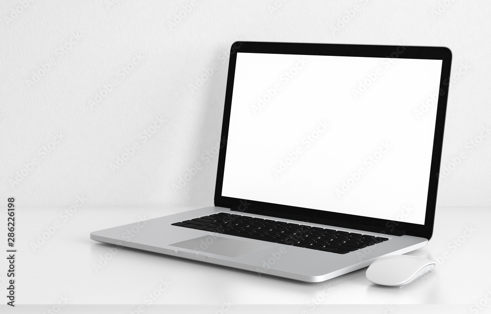 Computer laptop blank screen on white office desk, workspace mock up design illustration 3D rendering Computer laptop blank screen on white office desk, workspace mock up design illustration 3D rendering