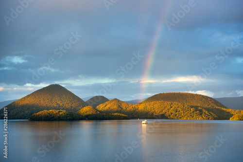 Lake toya in Toyoko town, Hokkaido Japan, Amazing view with the rainbow. photo