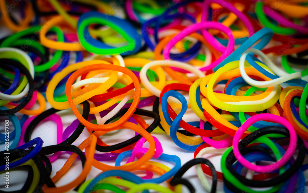 Colorful rubber band rope on the white background.