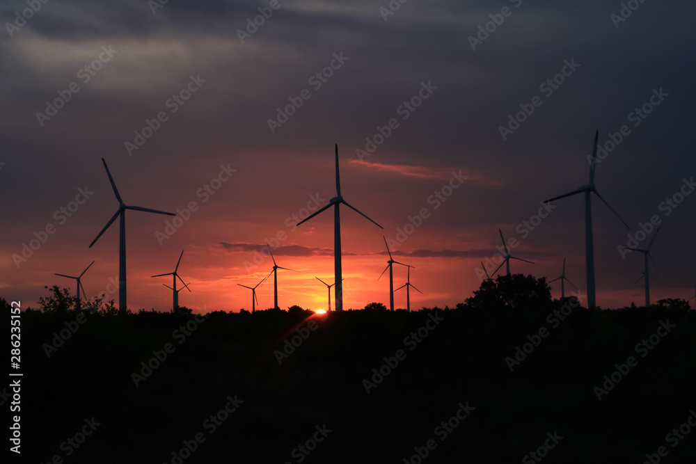 Landscape of evening with wind turbines Landscape of evening with wind turbines