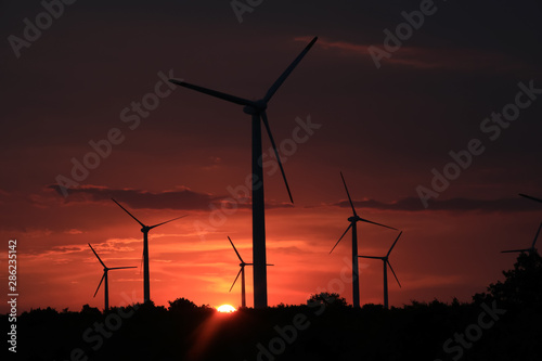 Landscape of evening with wind turbines