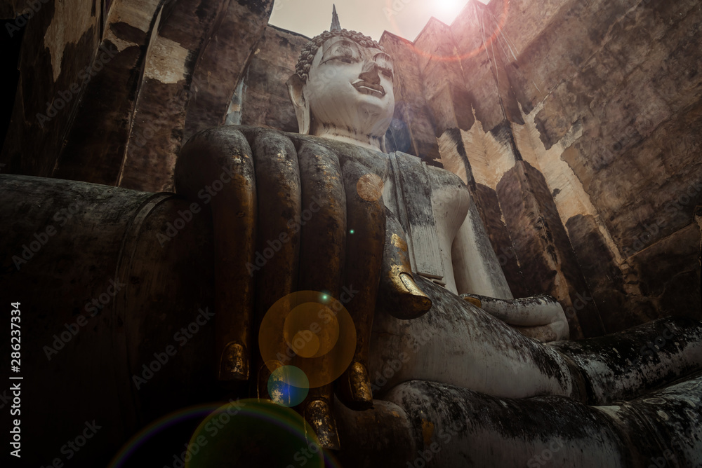 Old big Buddha statue, Wat Si Chum in Sukhothai historical park, Sukhothai, Thailand.