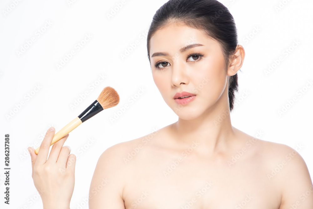 Beautiful Young Asian Woman short hair with Clean Fresh Skin. Face care, Facial treatment, Cosmetology, beauty and healthy skin and cosmetic ideas concept. Beautiful Young Asian Woman short hair with Clean Fresh Skin. Face care, Facial treatment, Cosmetology, beauty and healthy skin and cosmetic ideas concept.