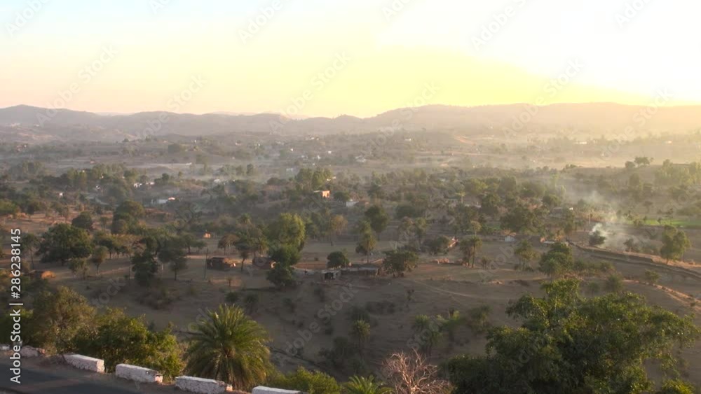 zoom in over beautiful hilly village area morning scene. zoom in over beautiful hilly village area morning scene.