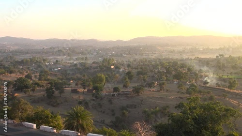 zoom in over beautiful hilly village area morning scene. photo