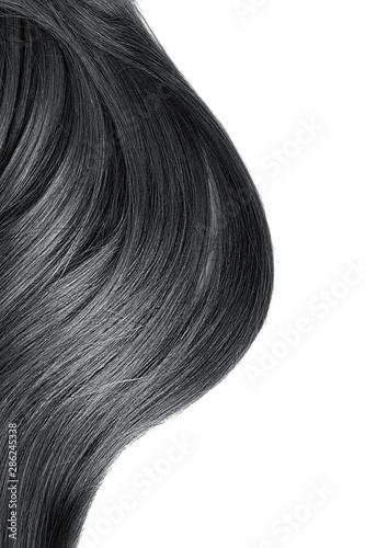 Natural brown hair isolated on white. Background, copy space