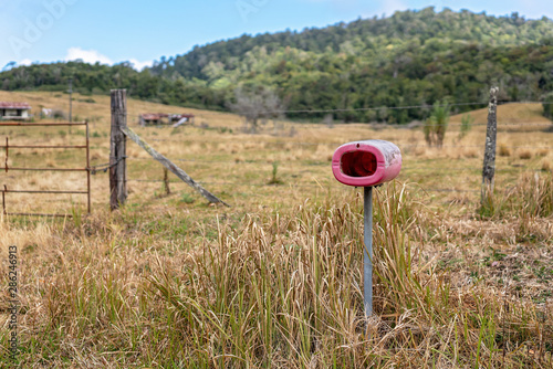 Old Letterbox In Front Of Deserted Australian Farm photo