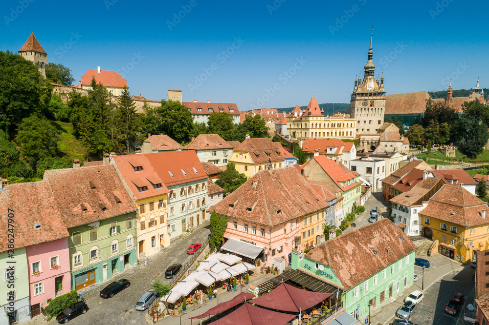 Aerial drone view of Sighisoara old city, Romania