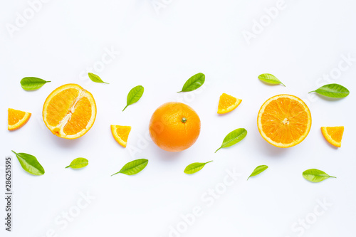 High vitamin C  Juicy and sweet. Fresh orange fruit with green leaves  on white.