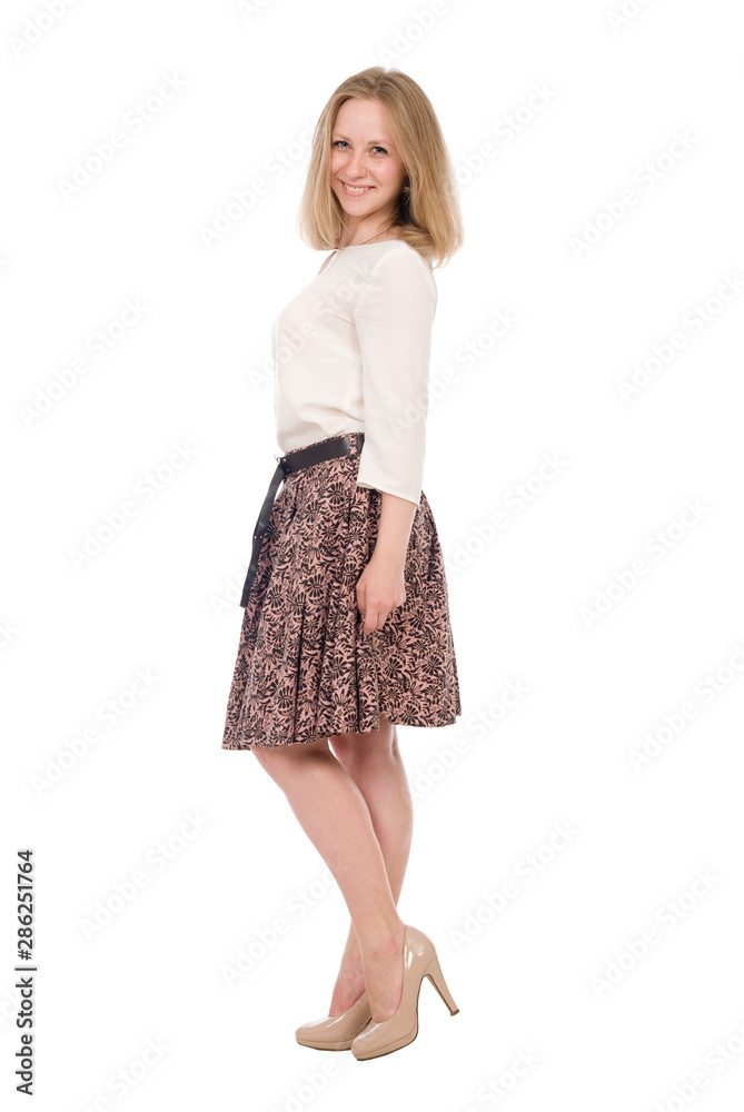 Fashion portrait young woman in skirt posing full length isolated over white Fashion portrait young woman in skirt posing full length isolated over white