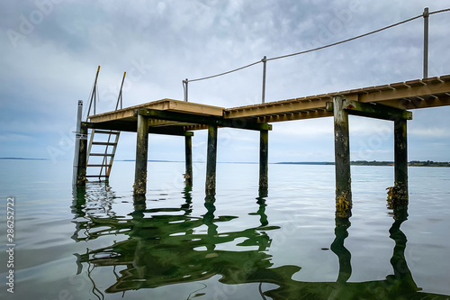 Reflections of a Pier on the Sea - Jutland - Denmark