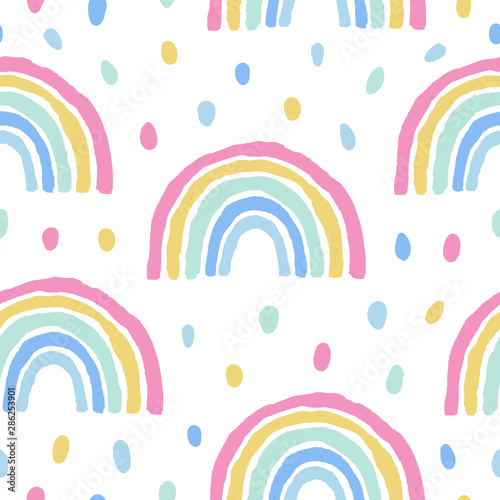 Rainbows and dots cute seamless pattern on white background