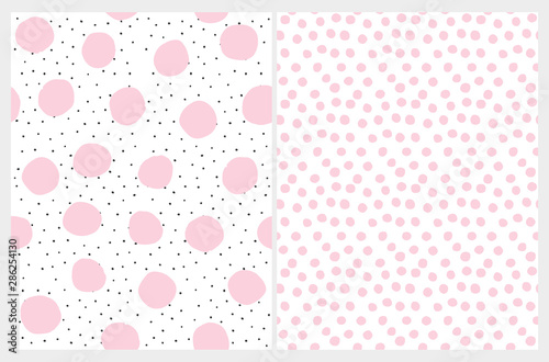 Cute Irregular Dotted Seamless Vector Patterns. Black Tiny Dots with Pink Ones Isolated on a White Background. Simple Print with Light Pink Polka Dots on a White. Lovely Pastel Color Dots Design.