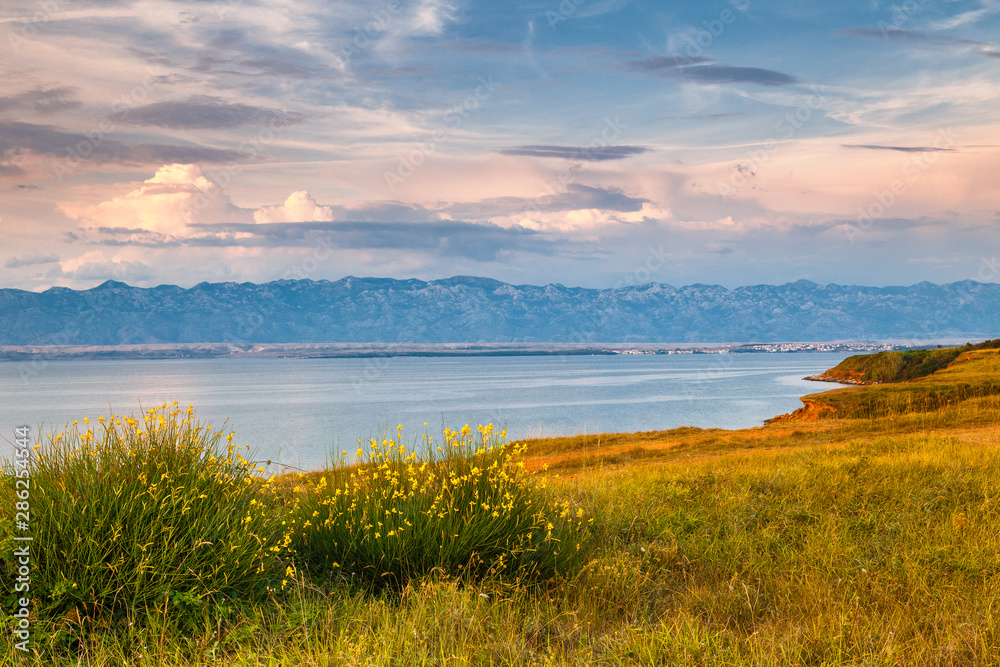Sea landscape with mountains on background at sunset, Vir island in Croatia, Europe.