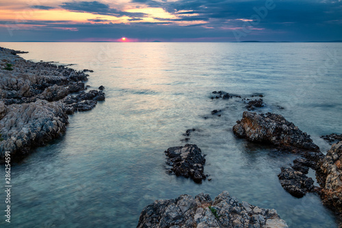 Sunset on the Adriatic sea at Vir island in Croatia, Europe. photo