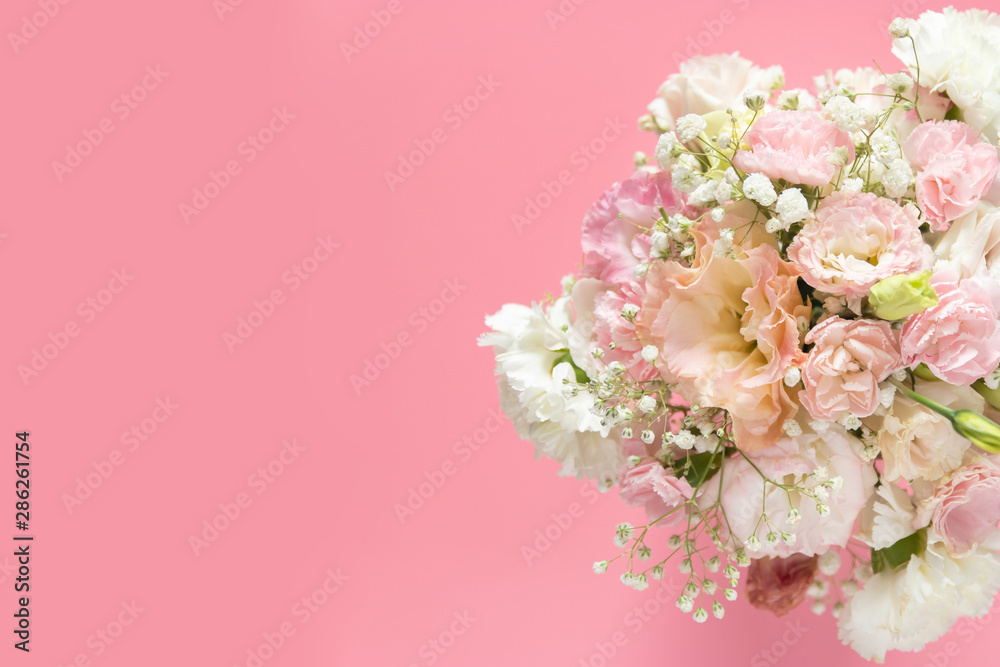 top view of beautiful romantic bouquet fresh spring flower on pink background with copy space top view of beautiful romantic bouquet fresh spring flower on pink background with copy space