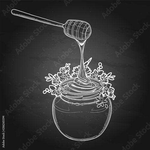 Graphic honey bottle decorated with buckwheat flowers