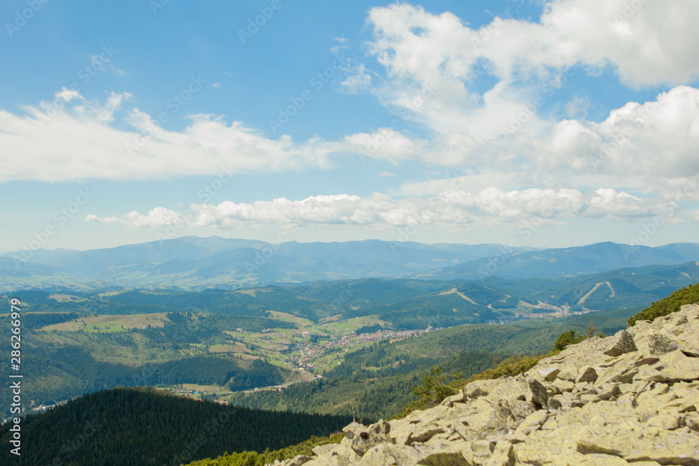 Beautiful mountain landscape, with mountain peaks covered with forest and a cloudy sky. Ukraine mountains, Europe