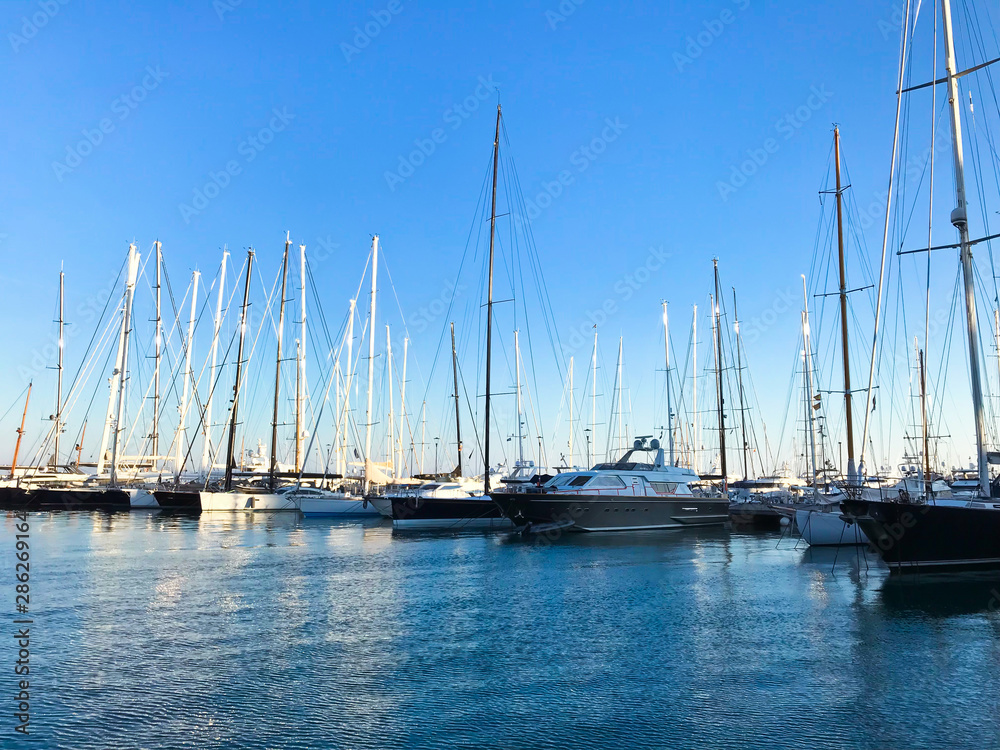 MALLORCA, SPAIN / Balearic - March 1, 2019: Marina port with yachts in Palma de Mallorca at Balearic Islands Spain. Carrer Del Moll marina skyline