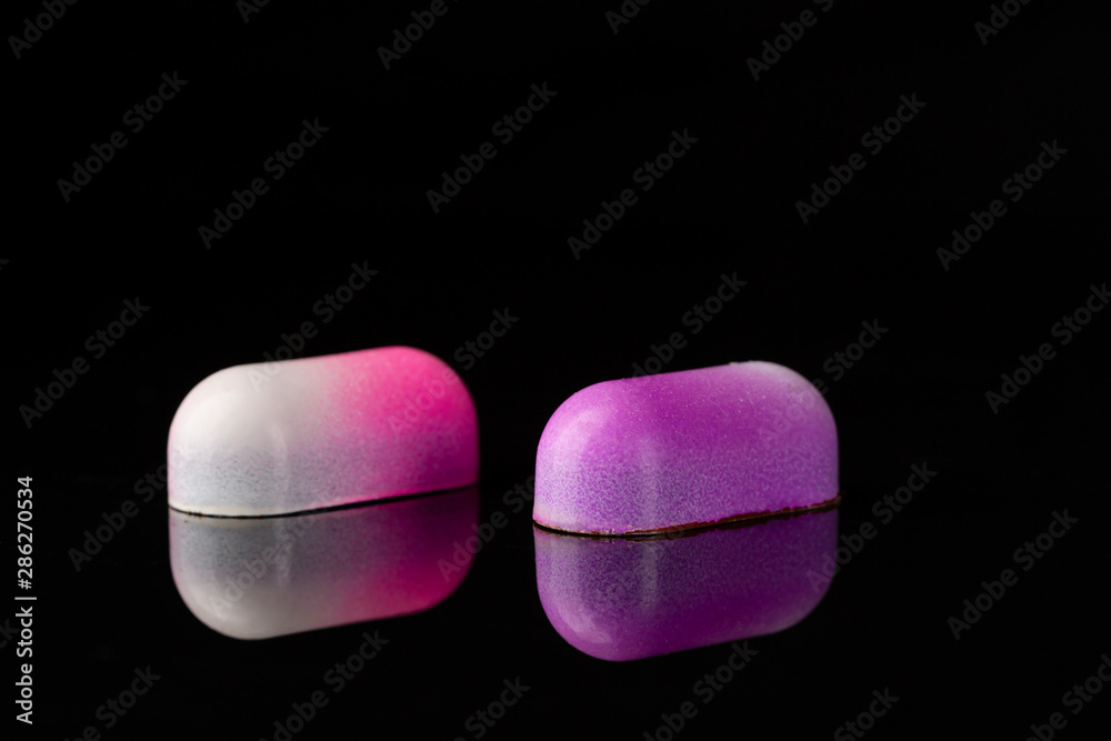 Two luxury chocolate bonbon close-up Two luxury chocolate bonbon close-up