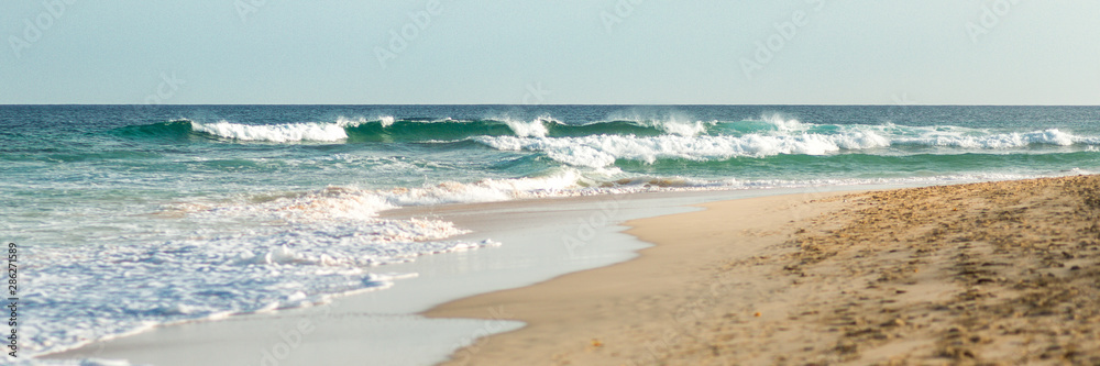 Waves on turquoise ocean, panorama