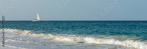 Fotografie, Obraz Yacht on blue ocean water