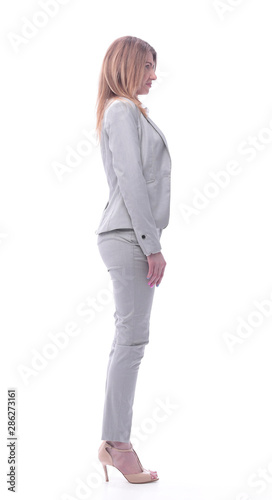 side view. confident young business woman in a light suit