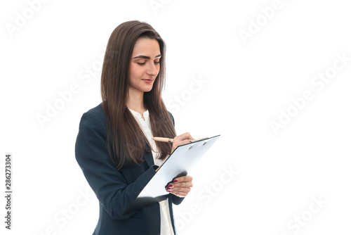 Smiling woman writing on clipboard isolated on white