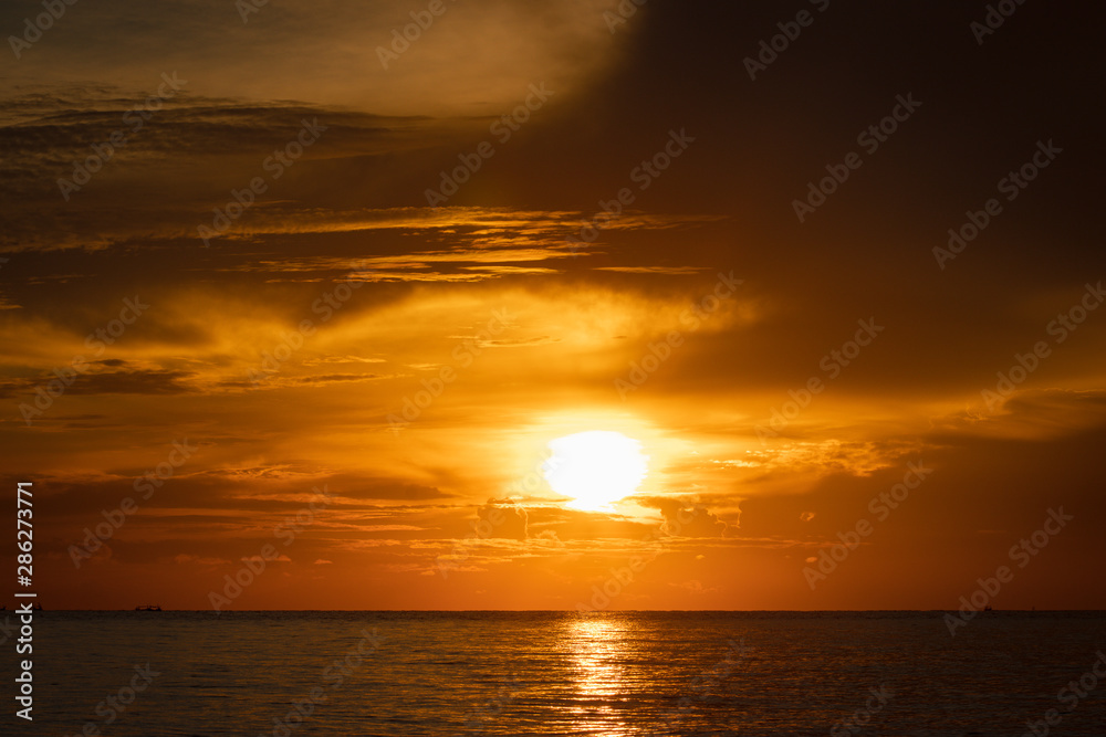 Beautiful sunrise on the sea. Low key of image.
