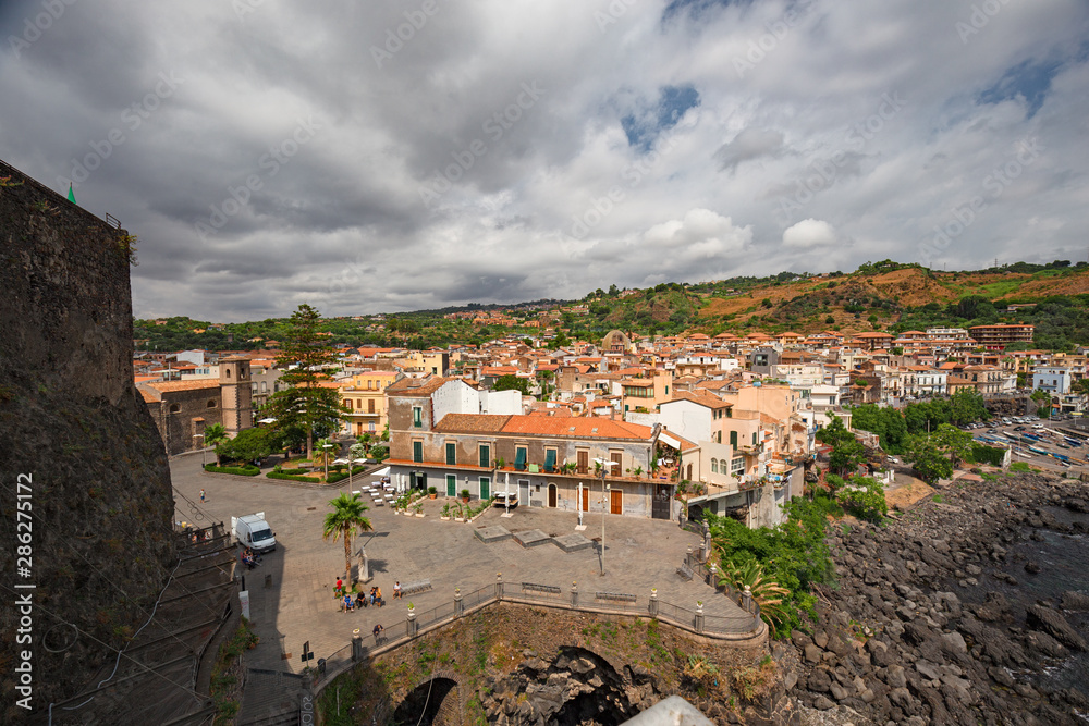Panoramic view of the city of Aci Castello in Sicily, Italy.