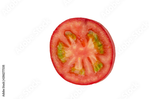 Fresh slice red tomato on a white background.