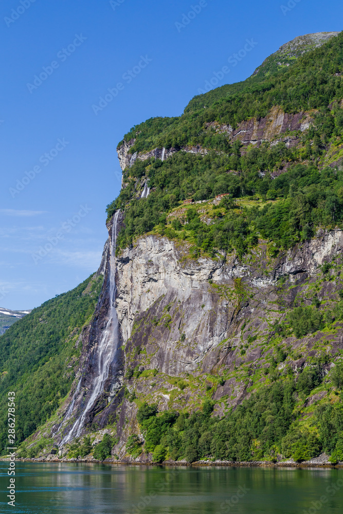 View on the famous high waterfall Seven sisters in Gerianger fjord in More og Romsdal county in Norway