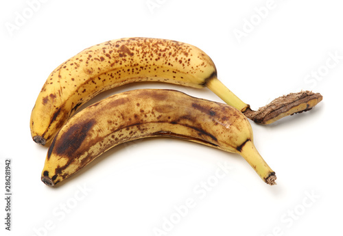 Overripe banana on white background