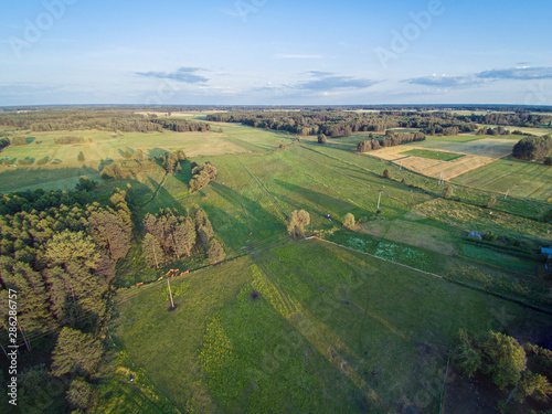 rural landscape, arable fields and meadows seen from the air, photos from the drone