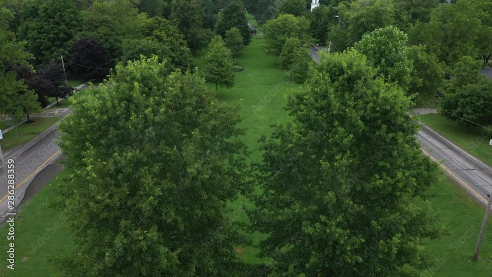 Aerial Middlefield Ohio city park trees. Settled late 1700's as pioneer religious settlement. Old Amish Mennonite town. Rural old order. Farming landscape. Old Amish Mennonite settlement. Aerial Middlefield Ohio city park trees. Settled late 1700's as pioneer religious settlement. Old Amish Mennonite town. Rural old order. Farming landscape. Old Amish Mennonite settlement.