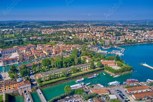 Fototapeta Naklejka Na Ścianę i Meble -  Aerial photography with drone. Beautiful view of the city of Peschiera del Garda, Italy.